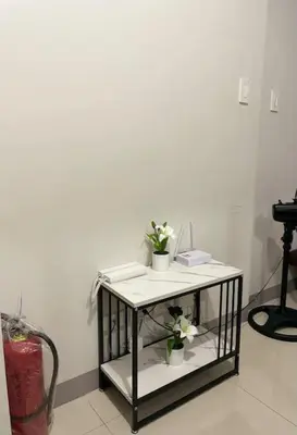 a table with potted plants on it in a room at Juliš Apartment S residence- Moa complex pasay in Manila