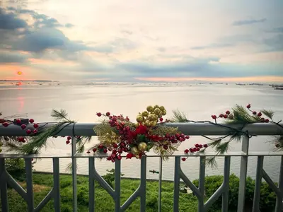 a wreath on a fence with a view of the water at Modern Luxury 4BR Manila Bay beside Okada Manila in Manila