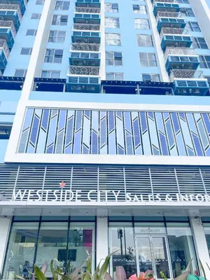 a tall building with a sign on the front of it at Luxurious 3BR in Manila Bay beside Okada in Manila