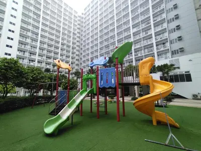 a playground with a slide and slides at Shore Residences Family Suite near MOA 1 Bedroom with Balcony - 3beds good for 6 person in Manila