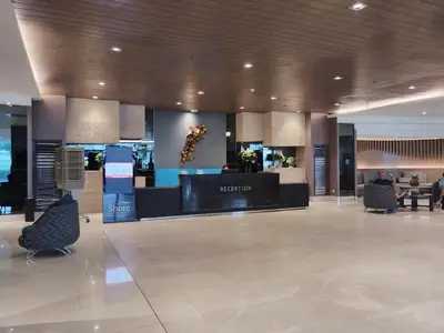 a lobby with a reception desk in a building at Shore Residences Family Suite near MOA 1 Bedroom with Balcony - 3beds good for 6 person in Manila