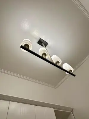 a chandelier hanging from the ceiling in a room at Studio Two Condominium - Alabang, BLK - Northgate Cyberzone, Filinvest City, Alabang - Netflix-ready Fiber Wi-Fi in Manila