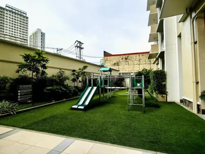 a playground in the middle of a building at Vincondotel Near BGC 2BR Fairlane in Manila