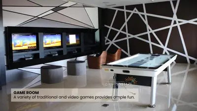 a game room with a video games console and a tv at 1Bedroom Beach View with Netflix near Airport in Manila