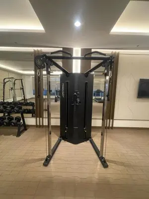 a gym with a machine in a room at Vincondotel Near BGC 3BR Fairlane in Manila