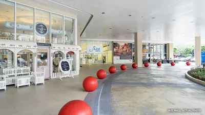 a mall with red balls in the middle of a building at Budget Family Group Room for 4 persons in Manila