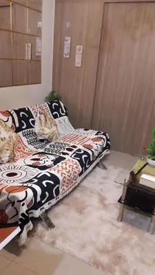 a room with two beds with cats on them at 3M Staycation in Manila