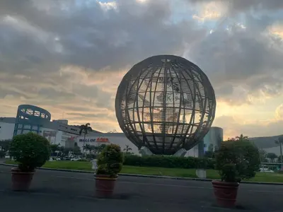 a large metal ball in the middle of a street at Gentry Manor Balcony Sea View WiFi Netflix Near Airport Okada 8B in Manila