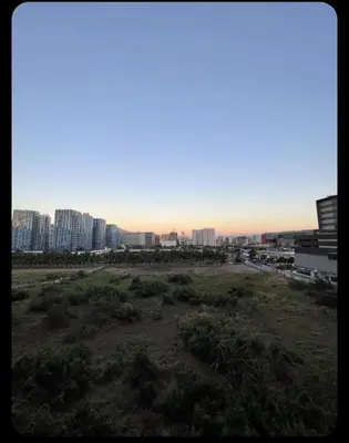 a view of a city with buildings in the background at JL shore Staycation in Manila