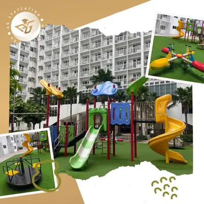 a playground in front of a building at 1br with Balcony near MOA unit 3 in Manila