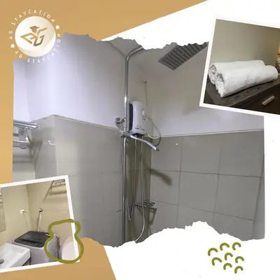 a picture of a bathroom with a shower in a room at 1br with Balcony near MOA unit 3 in Manila