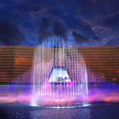 a building with a fountain in front of it at Gentry Manor Family Suite Facing Okada Fountain WiFi Netflix Near Airport 8A in Manila