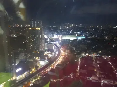 a view of a city at night with lights at 1BR Covent Garden South Tower University Belt- SM Sta Mesa, Metro Manila,Philippines in Manila