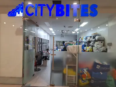 a store with a sign that reads city bikes at Velvet Room near MOA with a Cozy, Comfy Bed in Manila