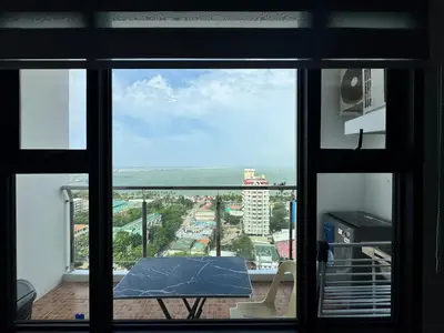 a view from the window of a room with a table at Condo in Malate in Manila