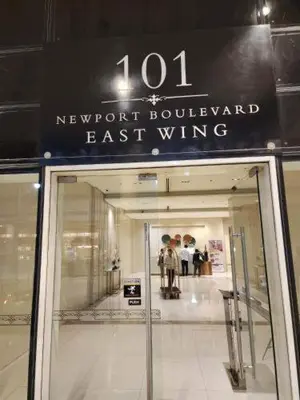 a building with a sign on the front of a store at Newport 101 - East Wing in Manila