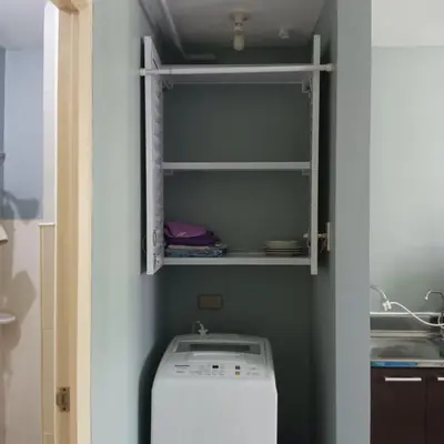 a laundry room with a washer and dryer at Josephine Macatula in Santa Rosa