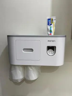 a white toaster is hanging on a wall at Satori Residences in Manila