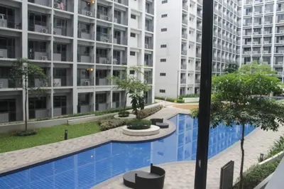 a view of an apartment complex with a swimming pool at Shore 2 Residence Tower 2 in Manila