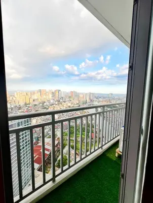 a balcony with a view of the city at Staycation in Mandaluyong near Makati and BGC in Manila