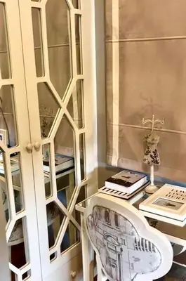a room with a desk and a glass cabinet at Havila, Amarilyo Home, Brgy San Juan, Taytay Rizal in Taytay