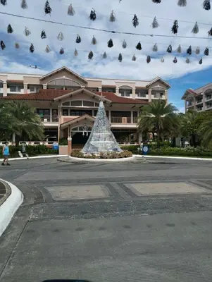 a christmas tree in the middle of a street at Life in refinement at Ivory Wood in Manila