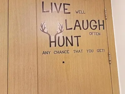 a door with the words live well laugh hunt on it at Condo Near MOA and NAIA at SoleMare Parksuites in Manila