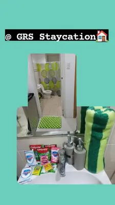 a bathroom with a sink and a mirror at Cozy simple 1 bedroom in Manila