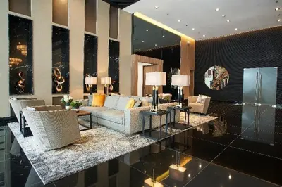 a living room with a couch and a table at Destina at Air Residences Makati MetroManila, Netflix in Manila