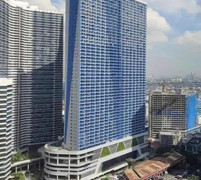 a view of a large building in a city at Destina at Air Residences Makati MetroManila, Netflix in Manila