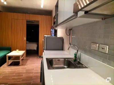 a kitchen with a sink and a microwave at Destina at Air Residence Makati, MetroManila, Netflx in Manila