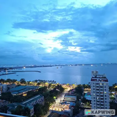 a view of a city and a large body of water at STAYLUXIA BOUTIQUE HOTEL MANILABAYVIEW - 1-5 BR Luxury and Superior Condos with, Balcony, Pool, Netflix & Gym- Housekeeping Available - in Manila
