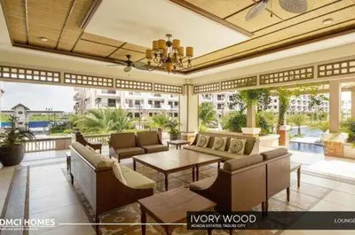 a large living room with couches and a table at The Cozysweet Homestay in Manila
