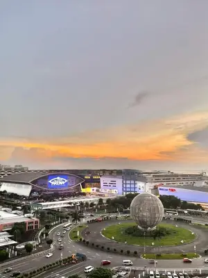 a view of a city with a stadium and a building at JAS Staycation in Manila