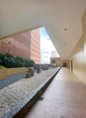 an empty hallway of a building with a building at Family Budget Room in Manila
