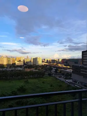 a frisbee flying in the sky over a city at Yutori Haus at Shore 3 Tower 2 near Mall of Asia Pasay City in Manila