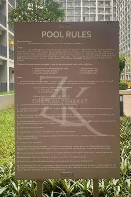 a sign in front of a building at Château Zen&Kat in Manila
