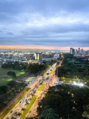 an overhead view of a busy city street at night at Stunning Sunset Retreat at Eton Bayview II 2pax in Manila