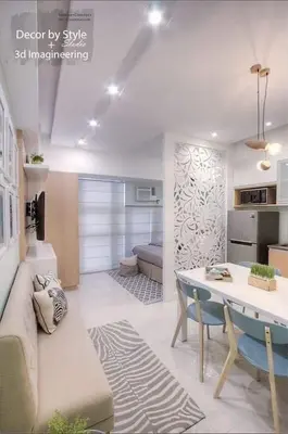 a living room with a couch and a table at Viceroy residence McKinley BGC taguig in Manila