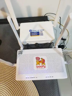 two laptops sitting on top of a chair at 642 - Quiet & secured condo in Cavite with HI speed WIFI in Dasmariñas