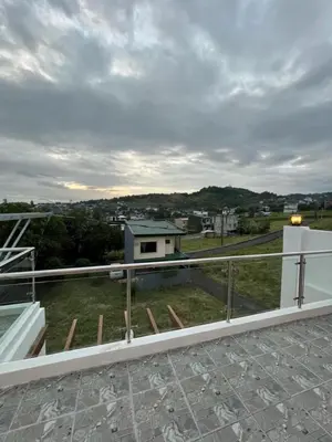a view from the balcony of a house at Casa Estela in Binangonan