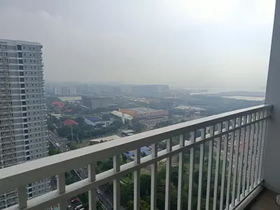 a view of a city from the balcony of a building at Affordable staycation in Pasay-Breeze Residence in Manila