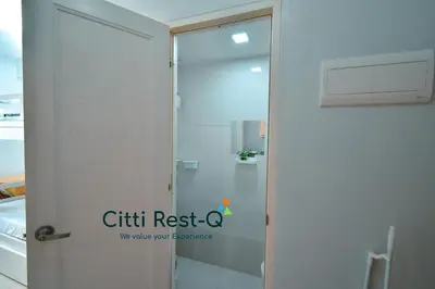 a glass shower door with the text cut rest c on it at Studio City Alabang Pool Access Free for 2 Wifi & Netflix SC2 in Manila