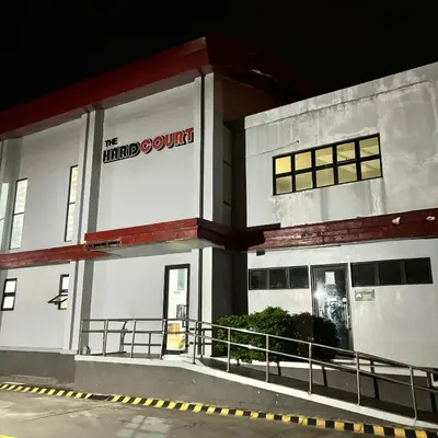 a building with the headcourt court sign on it at Metroshore Azure 2 in Manila