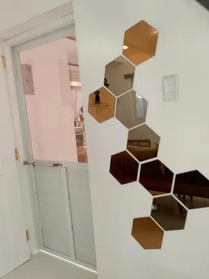 a room with a hexagonal wall art on the wall at Montalban Villa in General Trias
