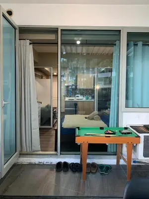a ping pong table in front of a room at Azure Urban Resort - Rio Tower in Manila