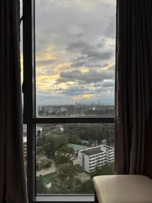 a view of a city from a window at 1BR Condo Near Venice Canal & BGC with Great View - 20k in Manila