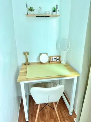 a white desk with a white chair under it at HiYara Loft - GA Tower 2, beside MRT BONI Station in Manila