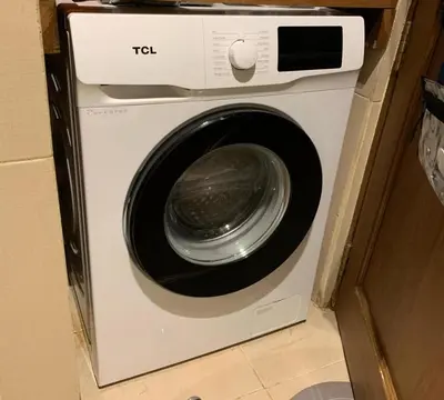 a washer and dryer in a room at Cozy, Spacious 1 Bedroom Condo, reach St Lukes BGC by foot in Manila