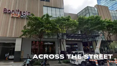 a store with the words across the street in front of it at Cozy, Spacious 1 Bedroom Condo, reach St Lukes BGC by foot in Manila